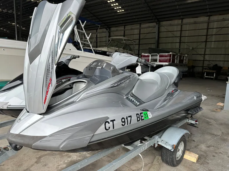Slide: The Image of 2009 Yamaha WaveRunner FX Cruiser H/O on a trailer in a storage facility. - 8