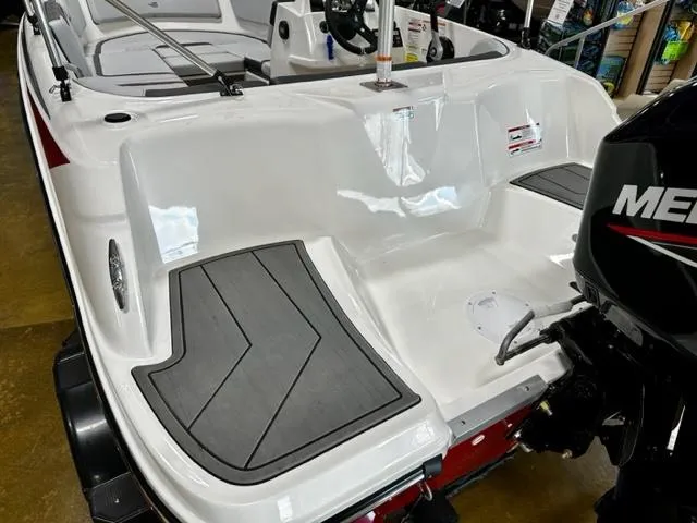 Slide: The Image of 2024 Bayliner Element M15 boat with Mercury outboard motor, rear deck view. - 4