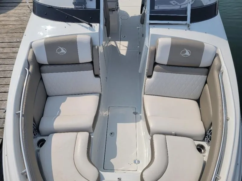 Slide: The Image of 2024 Finseeker 260 DC boat interior with plush seating and modern design. - 12