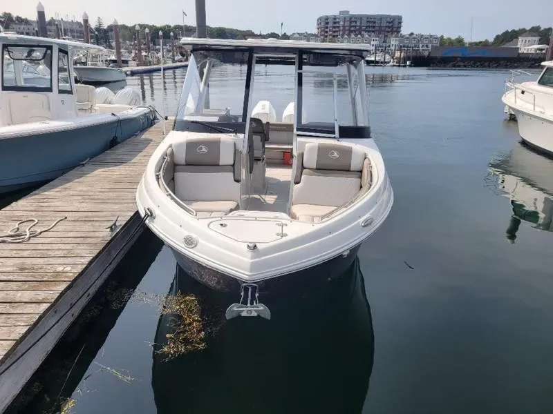 Slide: The Image of 2024 Finseeker 260 DC boat docked in a marina. - 16