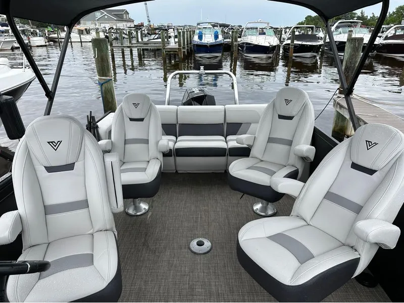 Slide: The Image of Interior of 2023 Viaggio D 23 Q boat with luxurious seating at marina. - 8