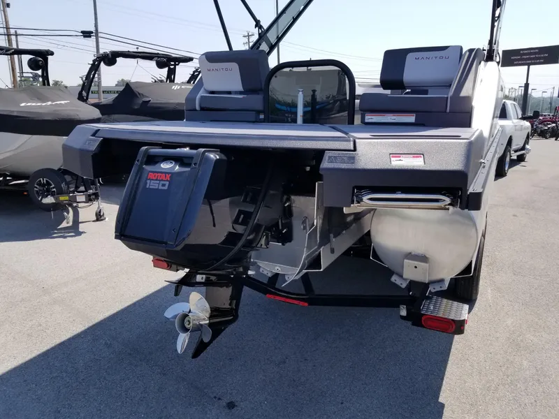 Slide: The Image of 2025 Manitou Cruise boat with Rotax 150 engine, rear view. - 23