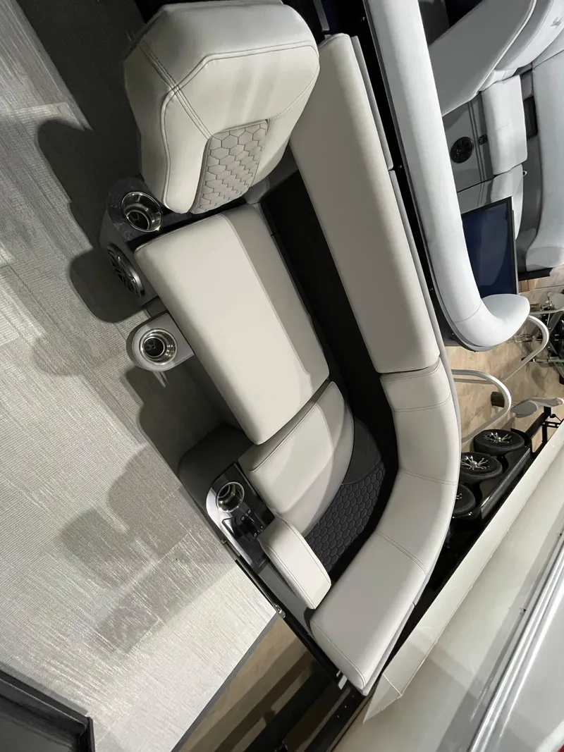 Slide: The Image of 2023 Apex Marine M22 boat interior seating with modern design. - 4