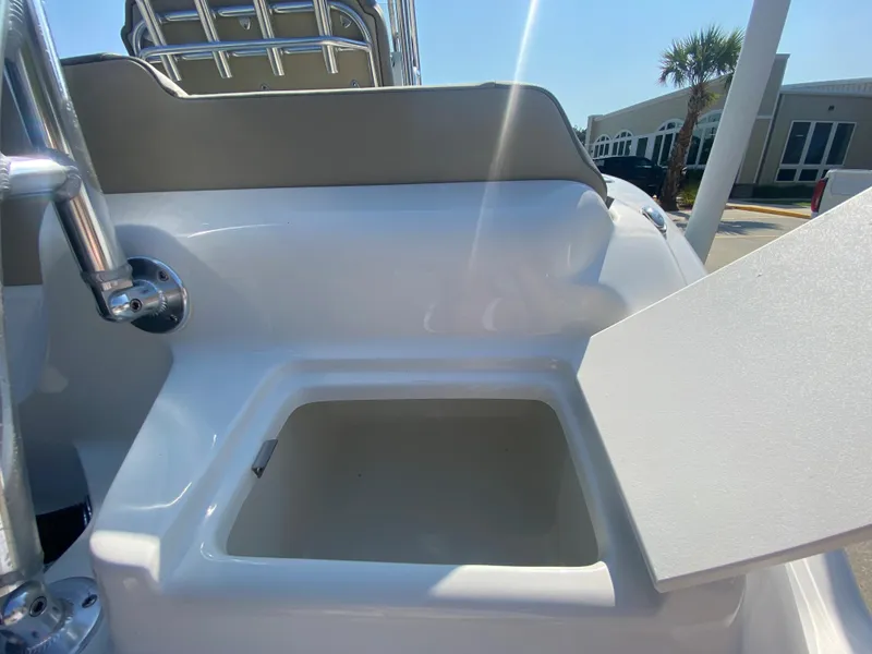 Slide: The Image of 2024 Key West 219 FS boat with open storage compartment. - 28
