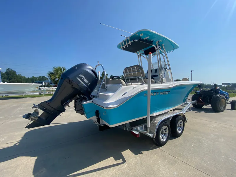 Slide: The Image of 2024 Key West 219 FS boat on trailer with Yamaha outboard motor. - 4