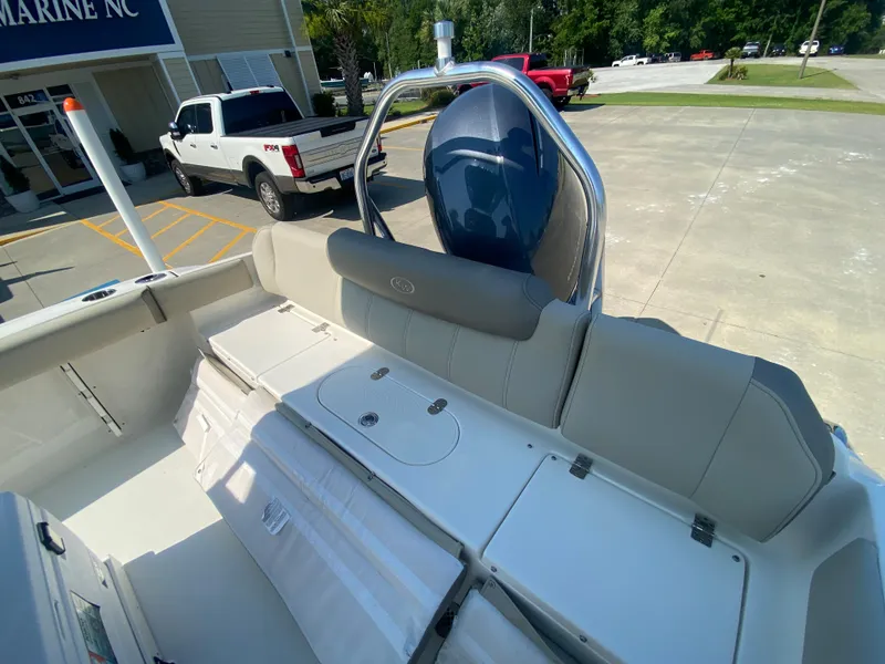 Slide: The Image of 2024 Key West 219 FS boat interior with seating and storage compartments. - 8