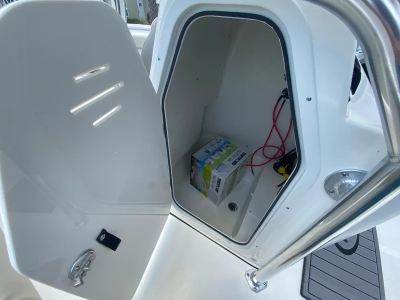 Slide: The Image of 2024 Key West 203 FS storage compartment with open door - 18