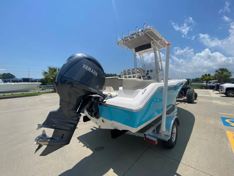 Slide: The Image of 2024 Key West 203 FS boat with Yamaha outboard motor on trailer. - 4