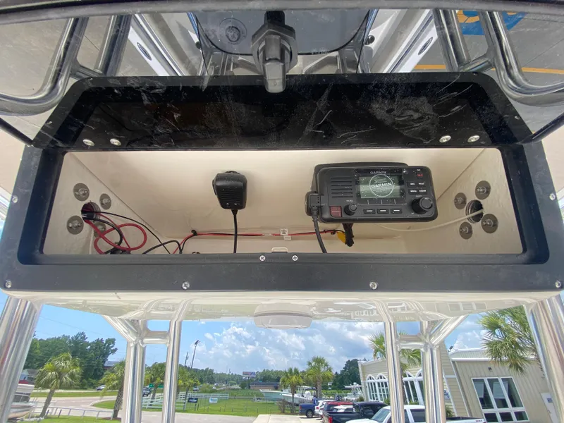 Slide: The Image of 2024 Key West 203 FS boat console with radio and wiring. - 17