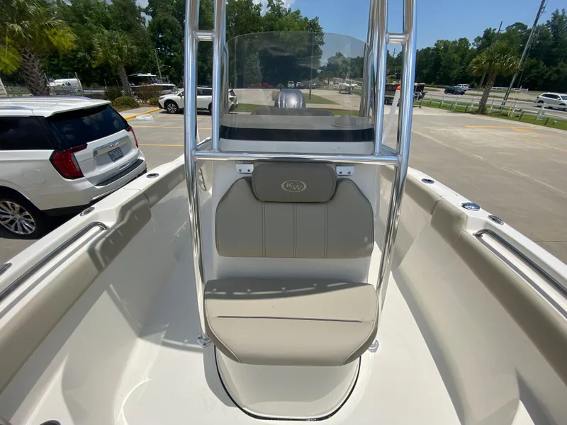 Slide: The Image of 2024 Key West 203 FS boat interior with seating and console. - 24