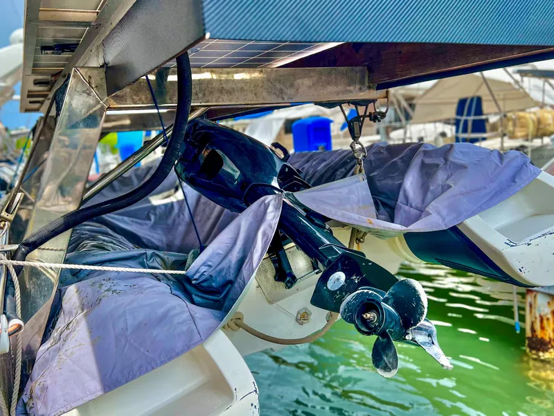 Slide: The Image of 2017 Fountaine Pajot Ipanema 58 Power Catamaran with covered outboard motor at marina. - 10