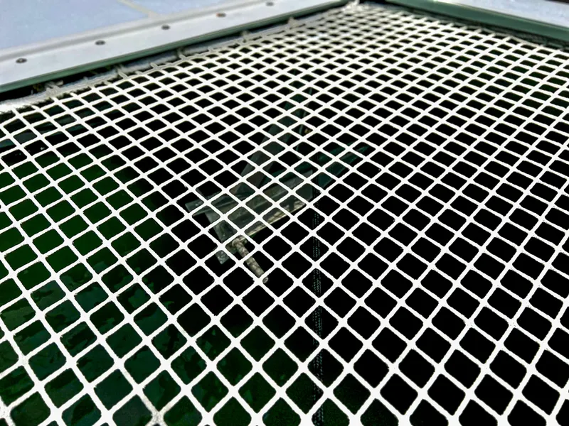 Slide: The Image of Close-up of the deck netting on a 2017 Fountaine Pajot Ipanema 58 Power Catamaran. - 17