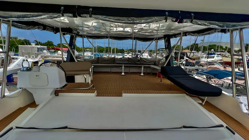 Slide: The Image of 2017 Fountaine Pajot Ipanema 58 Power Catamaran deck with seating and marina view. - 30