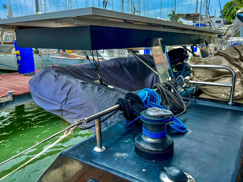 Slide: The Image of 2017 Fountaine Pajot Ipanema 58 Power Catamaran docked, featuring deck equipment and mooring lines. - 35