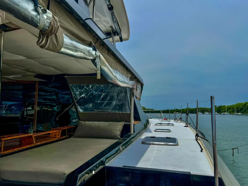 Slide: The Image of 2017 Fountaine Pajot Ipanema 58 Power Catamaran docked by the water. - 36