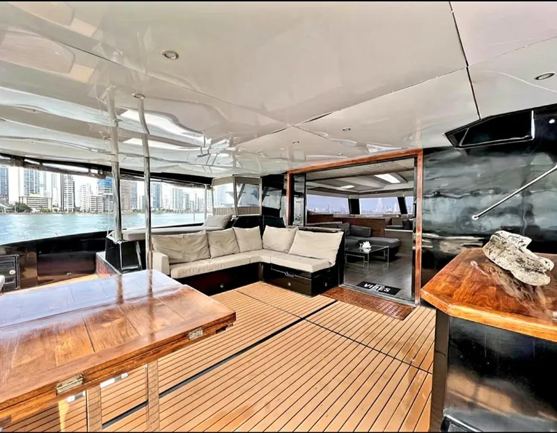 Slide: The Image of 2017 Fountaine Pajot Ipanema 58 Power Catamaran interior with spacious seating and wooden accents. - 40