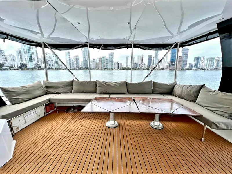 Slide: The Image of 2017 Fountaine Pajot Ipanema 58 Power Catamaran with spacious deck and city skyline view. - 43