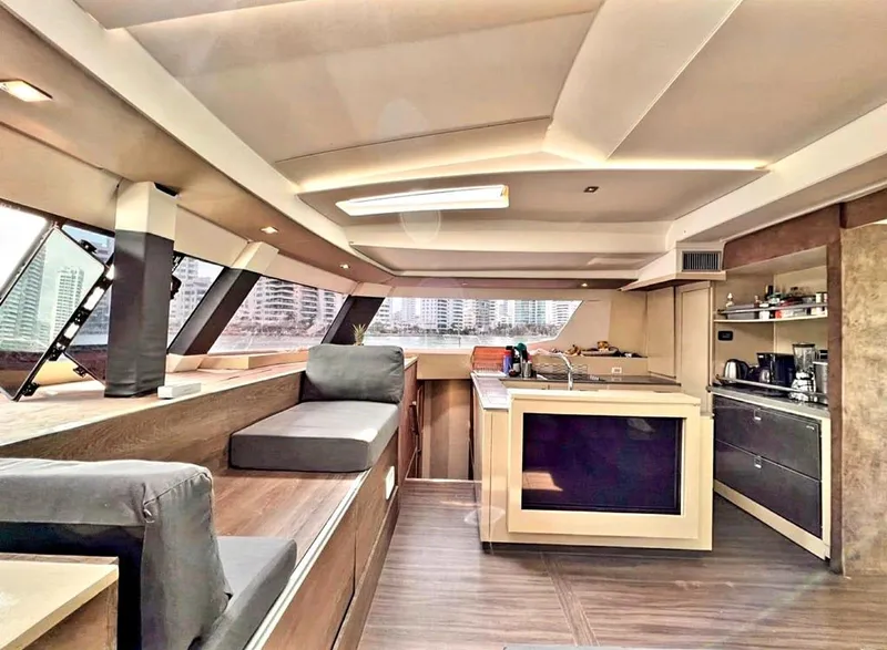 Slide: The Image of Interior of 2017 Fountaine Pajot Ipanema 58 Power Catamaran with modern kitchen and seating area. - 44