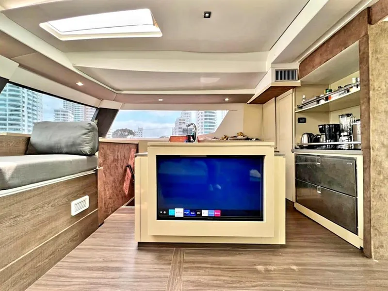 Slide: The Image of Interior of 2017 Fountaine Pajot Ipanema 58 Power Catamaran with modern kitchen and TV. - 45