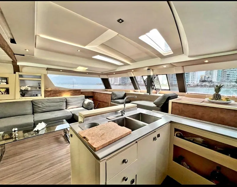 Slide: The Image of Luxurious interior of 2017 Fountaine Pajot Ipanema 58 Power Catamaran with modern kitchen and spacious seating area. - 46