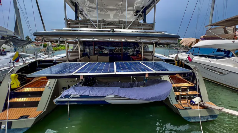 Slide: The Image of 2017 Fountaine Pajot Ipanema 58 Power Catamaran with solar panels docked at marina. - 8