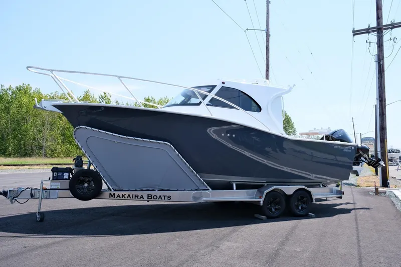 The Image of 2023 Makaira Gen3 800 boat on trailer, parked outdoors. - 1