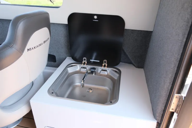 Slide: The Image of Makaira Gen3 800 boat interior with sink and seat, 2023 model. - 18