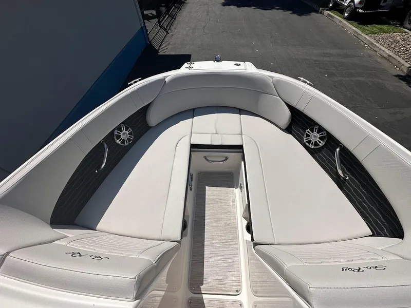 Slide: The Image of 2024 Sea Ray SPX 230 boat with spacious bow seating and modern design. - 13