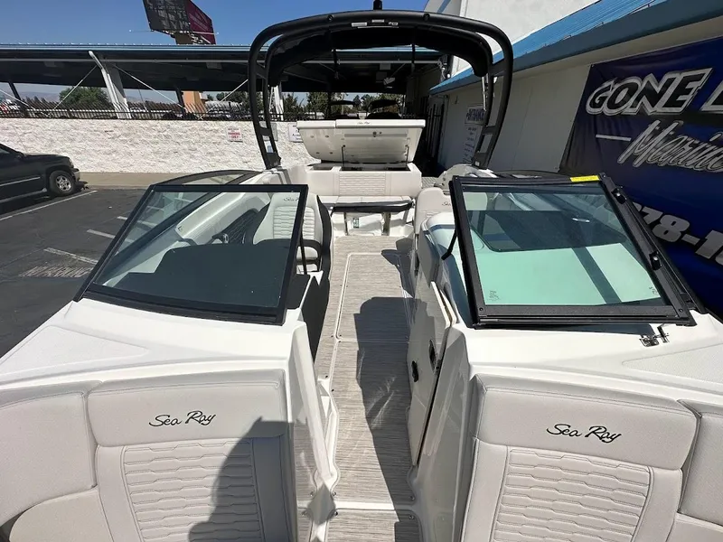 Slide: The Image of 2024 Sea Ray SPX 230 boat interior with open cockpit and seating. - 15