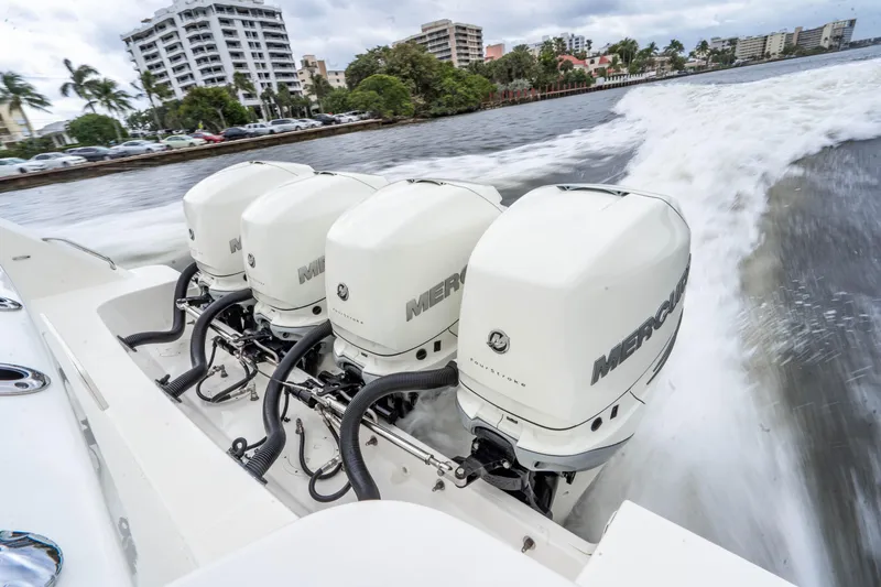 Slide: The Image of Boston Whaler 420 Outrage 2016 with four powerful Mercury outboard engines on the water. - 18