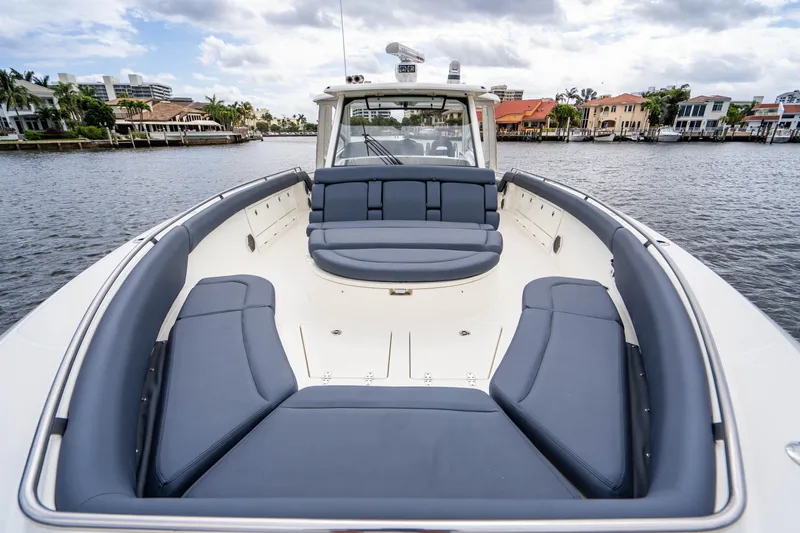 Slide: The Image of 2016 Boston Whaler 420 Outrage boat with spacious seating on a scenic waterway. - 40