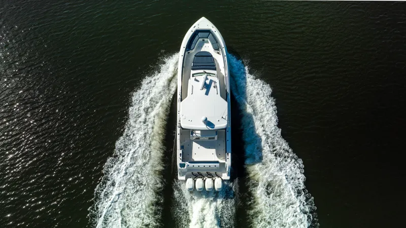 Slide: The Image of Aerial view of 2016 Boston Whaler 420 Outrage cruising on water. - 8