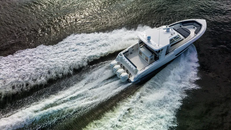 Slide: The Image of Boston Whaler 420 Outrage 2016 cruising on open water, aerial view. - 9