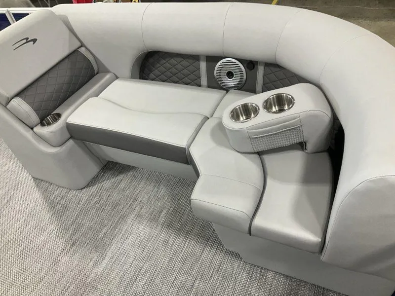 Slide: The Image of 2023 Bennington 23 LSB boat interior with gray seating and cup holders. - 10