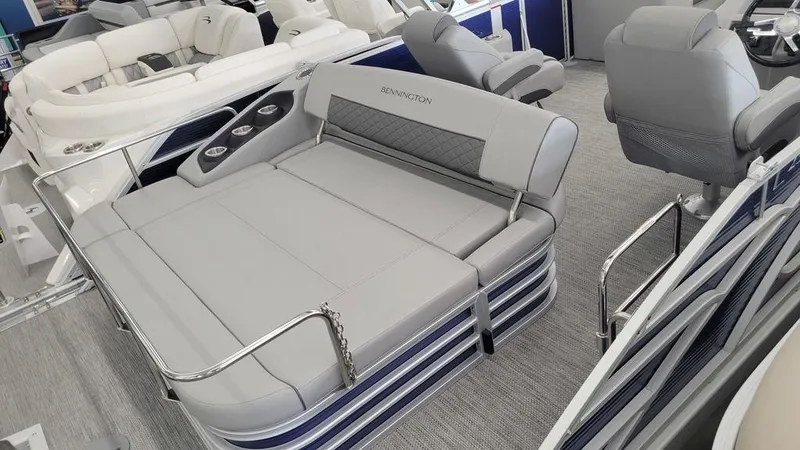 Slide: The Image of 2023 Bennington 23 LSB pontoon boat interior with luxurious seating. - 19