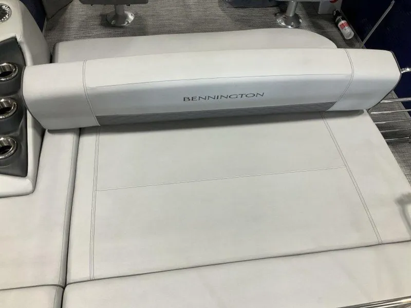Slide: The Image of 2023 Bennington 23 LSB boat interior seating with cup holders. - 4