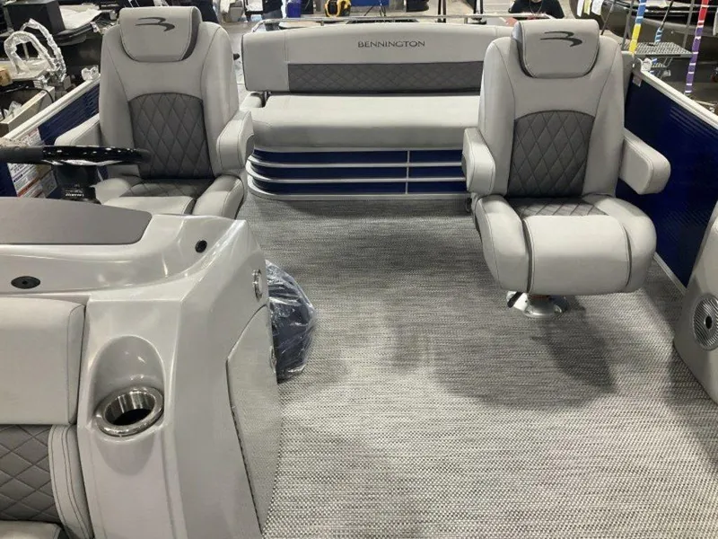 Slide: The Image of 2023 Bennington 23 LSB pontoon boat interior with plush seating and modern design. - 8