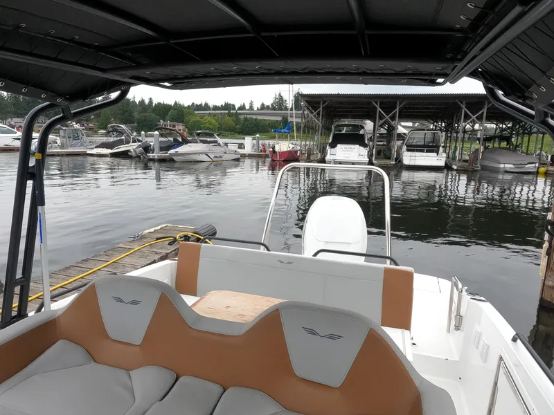 Slide: The Image of 2022 Beneteau Flyer 8 SUNdeck at a marina, view from the cockpit. - 19