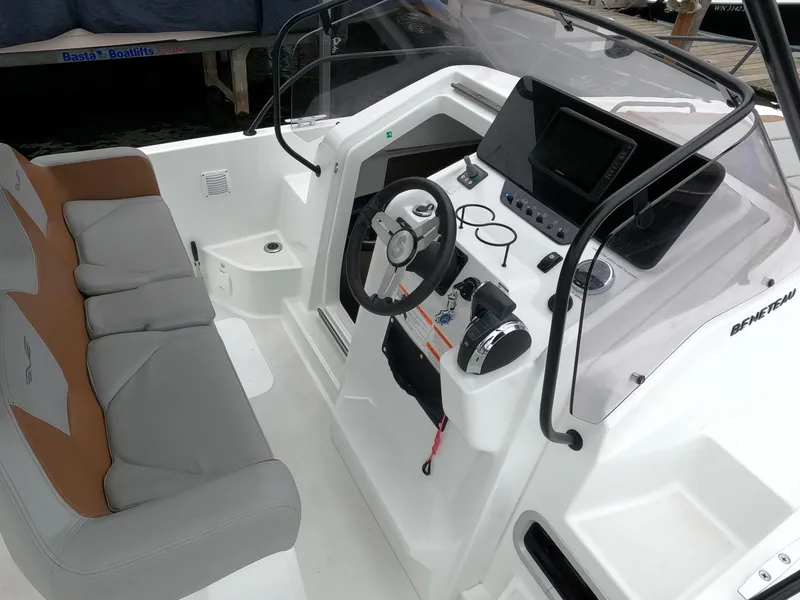 Slide: The Image of 2022 Beneteau Flyer 8 SUNdeck boat interior with steering console and seating. - 26