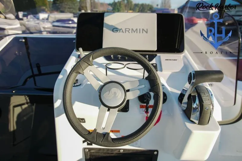 Slide: The Image of Beneteau Flyer 8 SUNdeck 2022 helm with Garmin navigation system and steering wheel. - 5