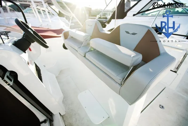 Slide: The Image of 2022 Beneteau Flyer 8 SUNdeck interior with modern seating and steering wheel. - 7
