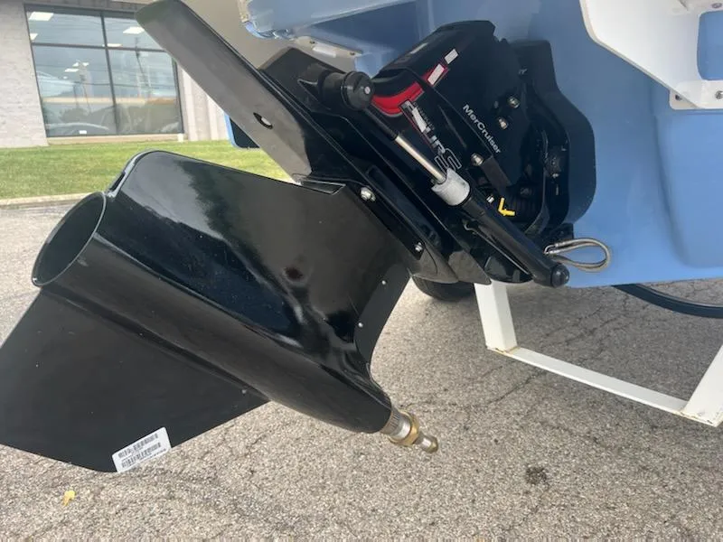 Slide: The Image of 2023 Chaparral 21 Surf boat outdrive and propeller detail. - 8