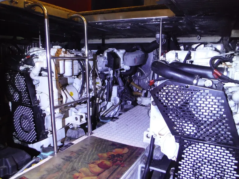 Slide: The Image of Engine room of a 2005 Cruisers Yachts 455 Express Motoryacht. - 49
