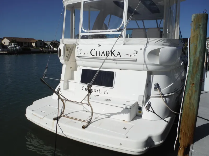 Slide: The Image of 2005 Cruisers Yachts 455 Express Motoryacht docked in Gulfport, FL. - 6