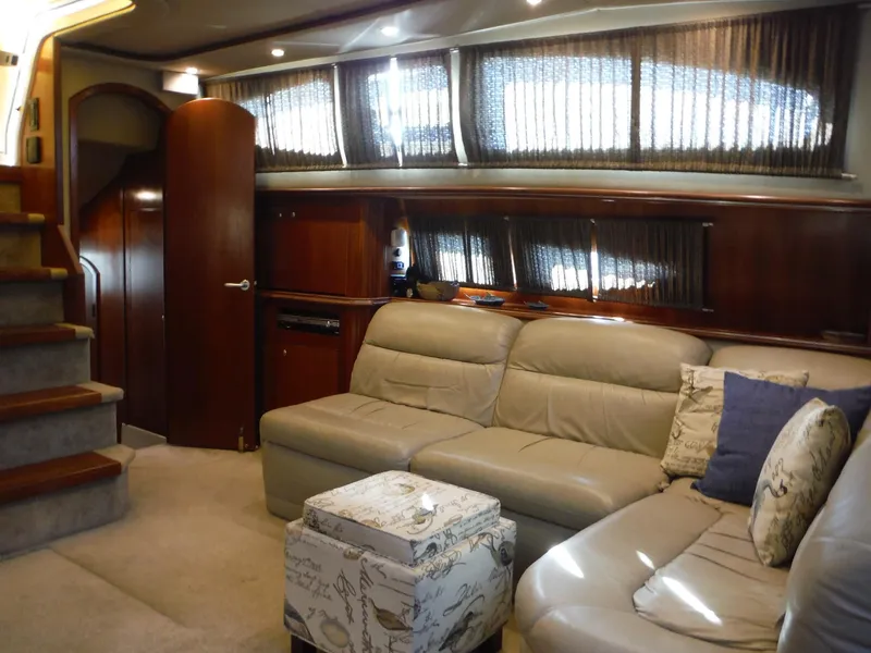 Slide: The Image of Luxurious interior of 2005 Cruisers Yachts 455 Express Motoryacht with leather seating and wooden accents. - 21