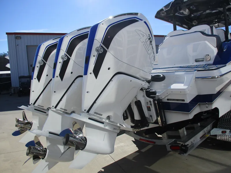 Slide: The Image of 2021 Sunsation 40CCX boat with triple outboard engines. - 11
