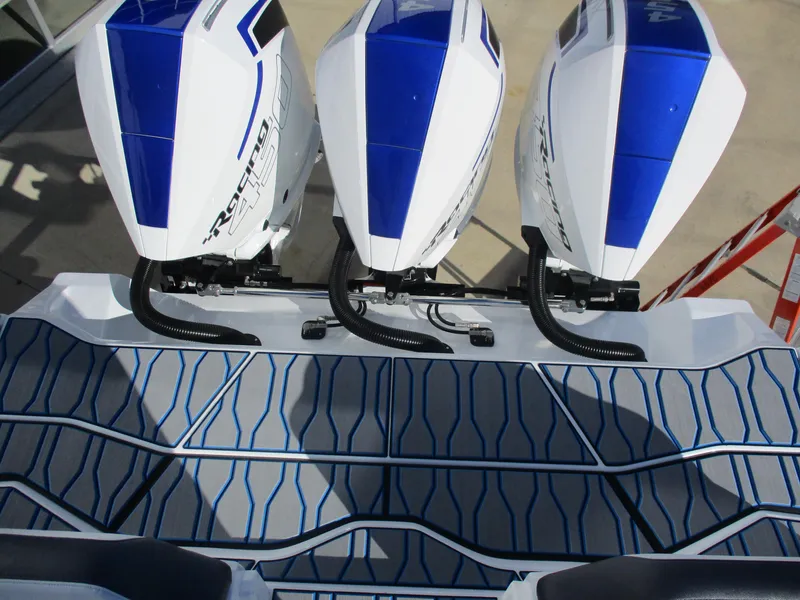 Slide: The Image of 2021 Sunsation 40CCX boat with triple outboard engines. - 12