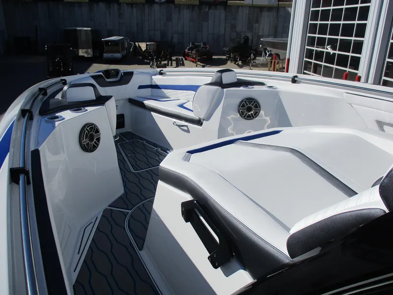 Slide: The Image of 2021 Sunsation 40CCX boat interior with white and blue seating. - 31