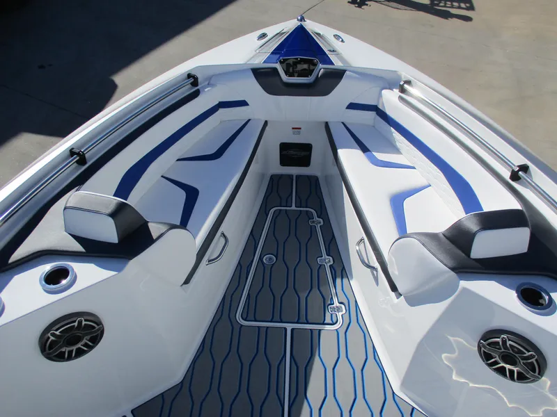 Slide: The Image of 2021 Sunsation 40CCX boat interior with white and blue seating. - 33