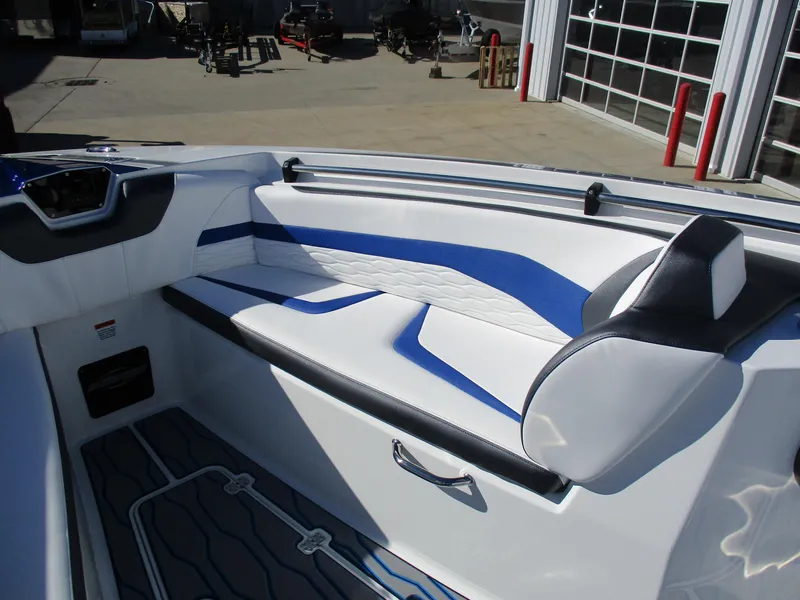 Slide: The Image of 2021 Sunsation 40CCX boat interior with white and blue seating. - 35